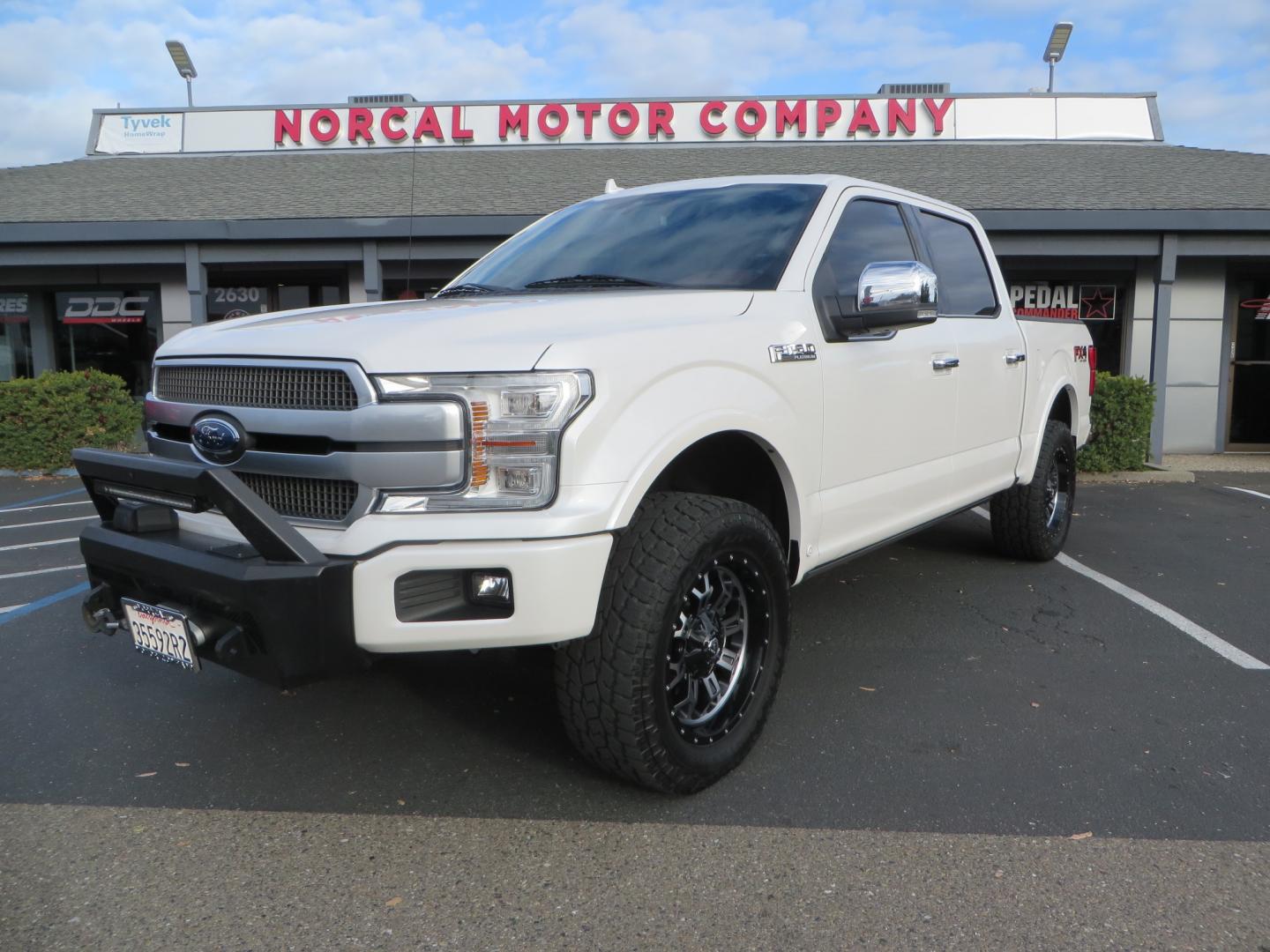 2019 White /BLACK INT W/DARK MARSALA LT Ford F-150 Platinum SuperCrew Cab 4WD (1FTEW1E45KF) with an 3.5L V6 ECOBOOST engine, 10-SPEED AUTO W/TOW MO transmission, located at 2630 Grass Valley Highway, Auburn, CA, 95603, (530) 508-5100, 38.937893, -121.095482 - F150 Platinum featuring a level kit, Fuel Offroad wheels, Toyo AT2 tires, Barricade Front winch bumper, Smittybilt winch, LED light bar, Undercover Ultraflex bedcover, and a Cargo Glide bed system. - Photo#0